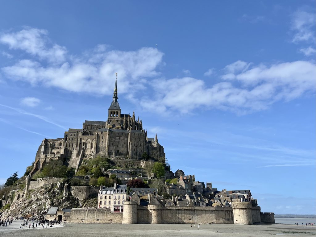 Mont Saint-Michel abbey island viewed from the mainland during daytime